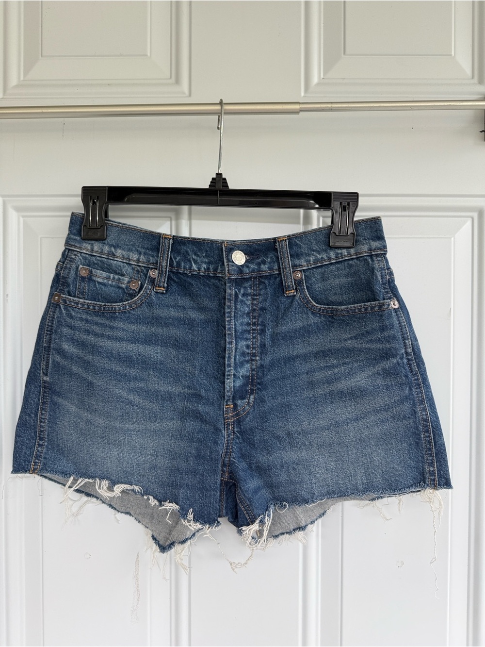 GAP Distressed Denim Cutoff Shorts in Medium Blue